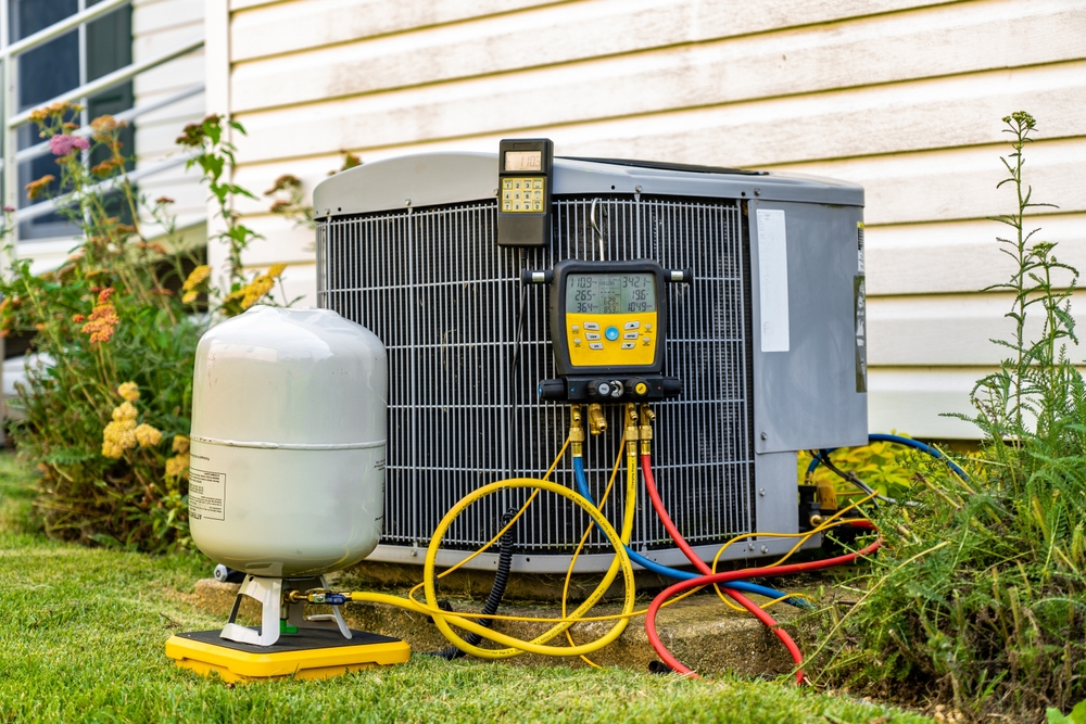 HVAC unit being upgraded by an HVAC service technician