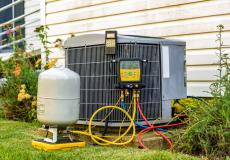 HVAC unit being upgraded by an HVAC service technician