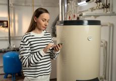 residential boiler repair pictured with concerned boiler basement resident